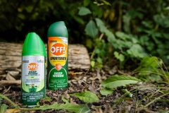 Two cans of OFF bug spray Deep Woods in the forest